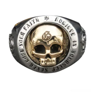 Unisex gothic skull ring featuring full engraved text around central gold skull, direct front view showcasing intricate detail