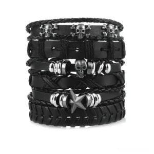 Black gothic skull and star leather bracelet set of 6 adjustable wristbands flat lay view