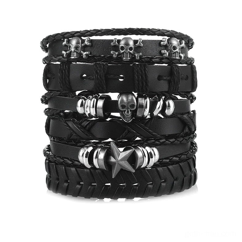 Black gothic skull and star leather bracelet set of 6 adjustable wristbands flat lay view