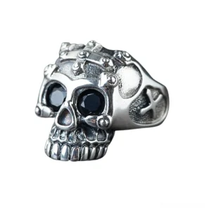 Gothic skull ring sterling silver front view with black gem eyes and studded crown detail