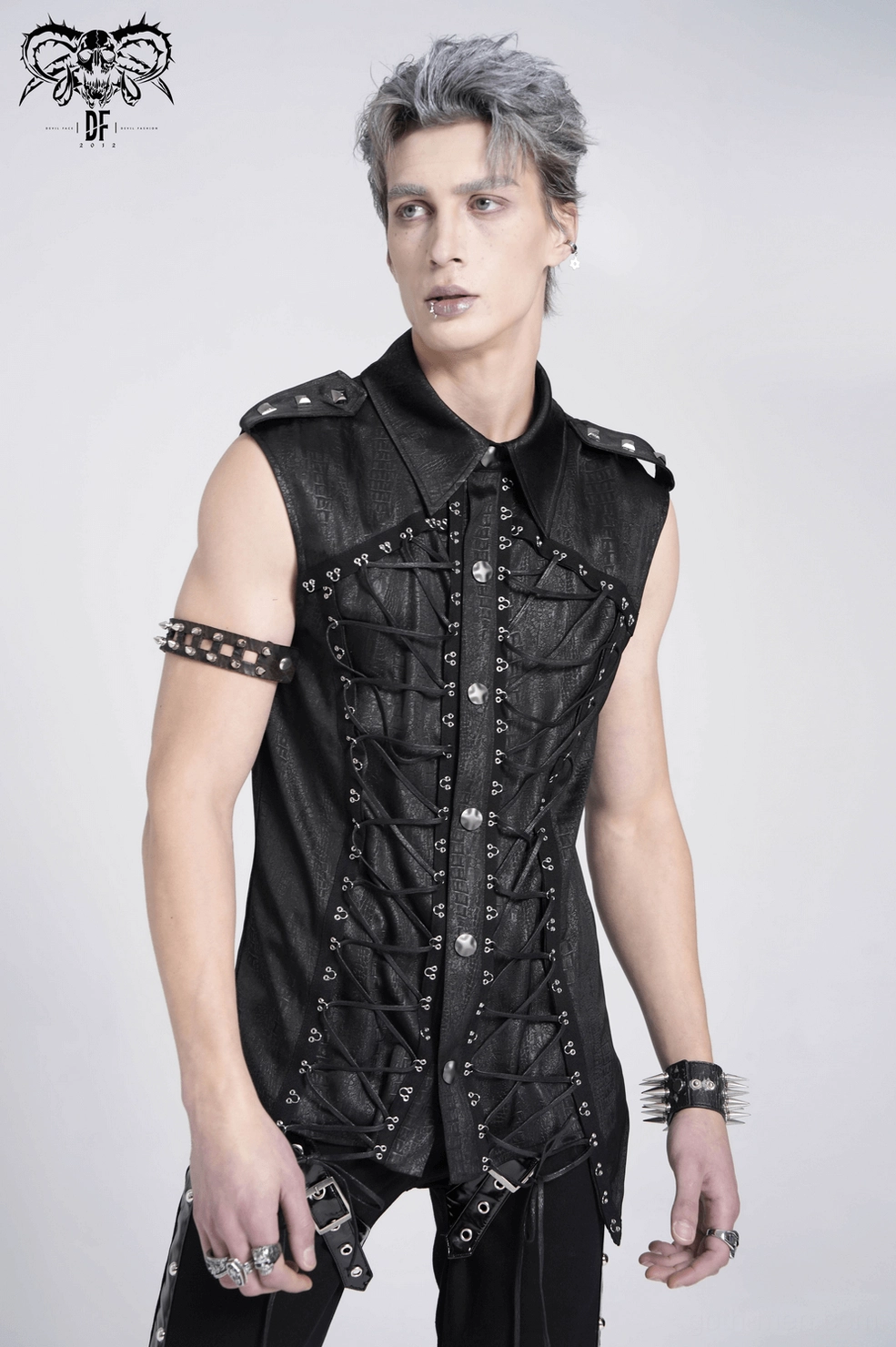 Gothic punk sleeveless lace-up shirt worn on model highlighting alternative fashion aesthetic and arm presentation