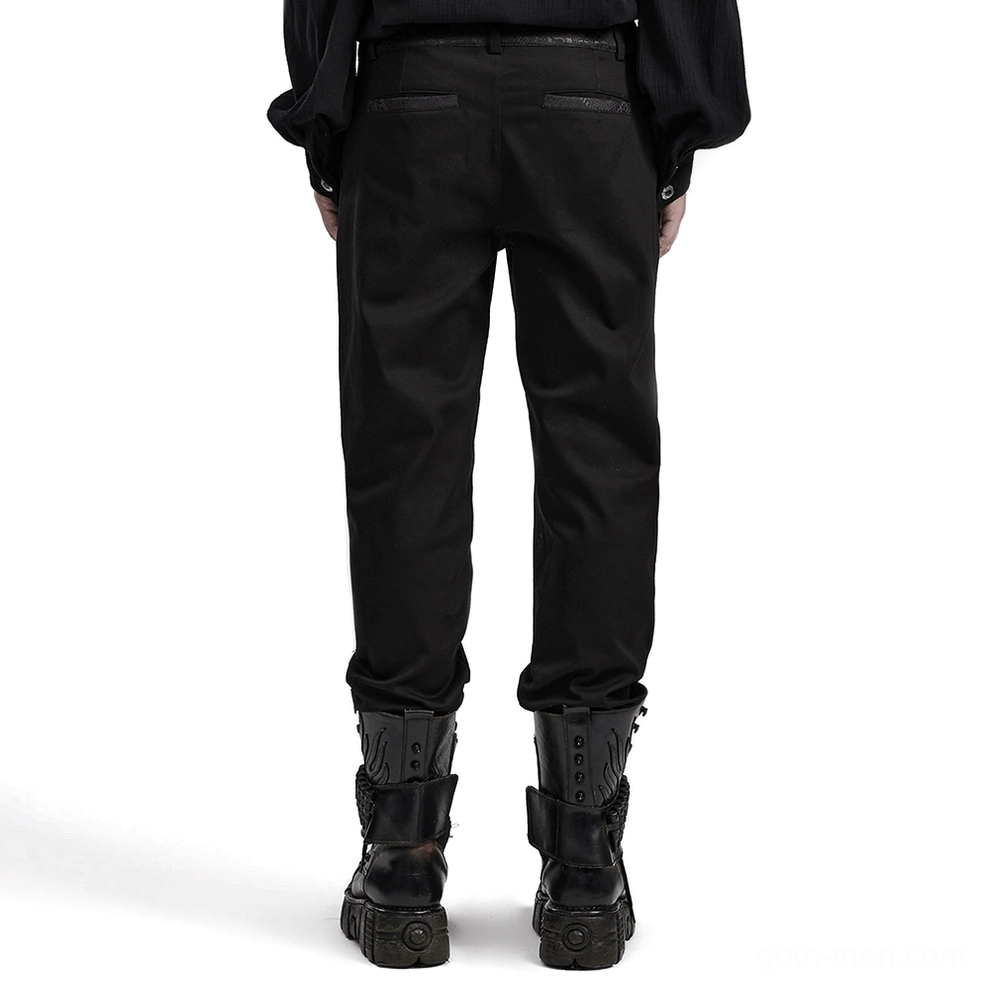 Gothic slim-fit trousers rear view on model, showing back welt pockets with jacquard trim detail