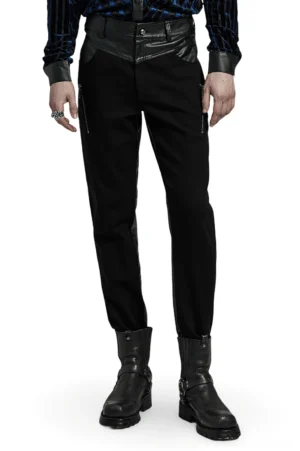 Gothic slim-fit pants front view with skull button and PU leather waist panel on male model in studio