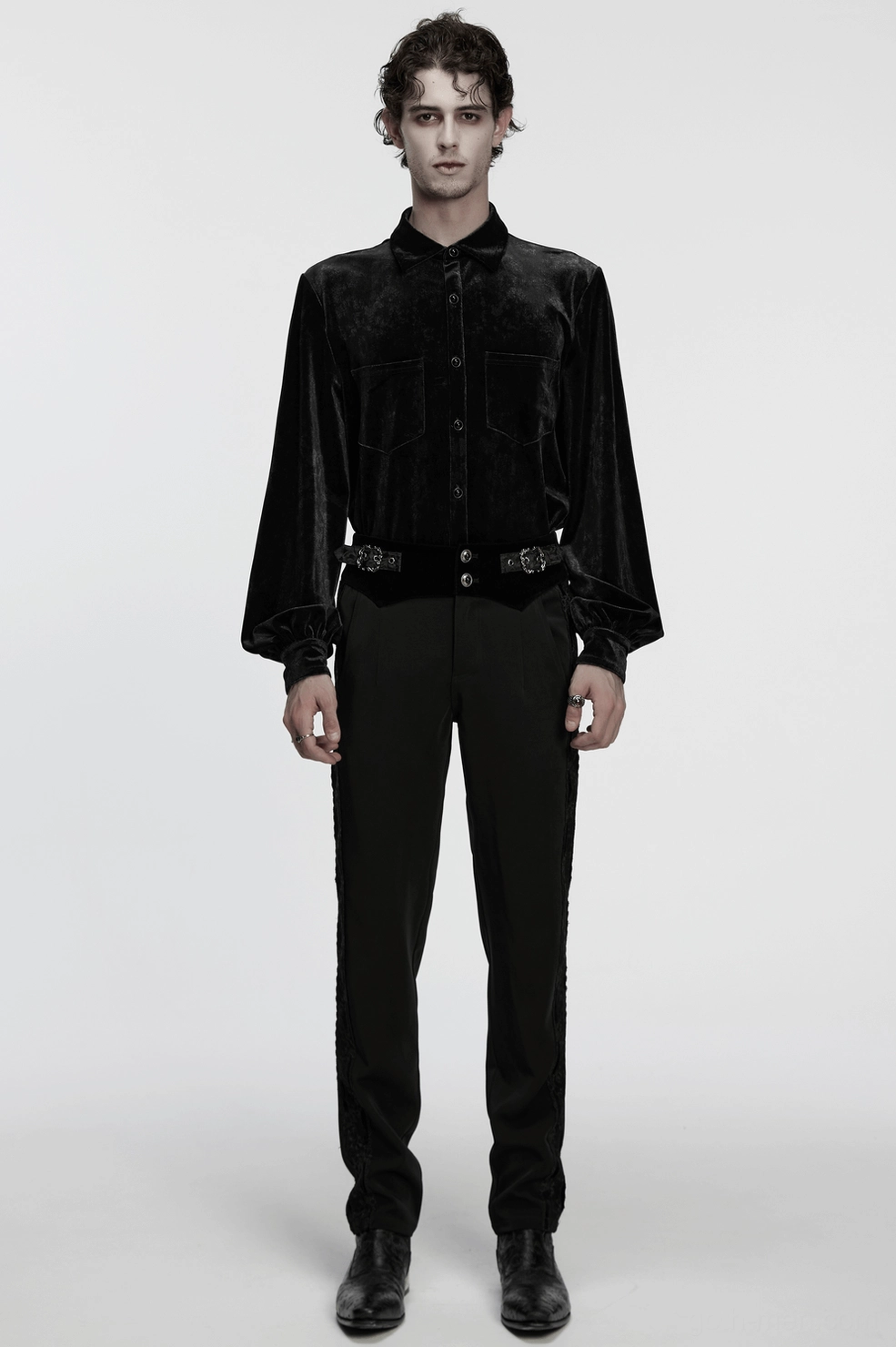 Gothic slim-fit trousers construction detail showing lace panel integration