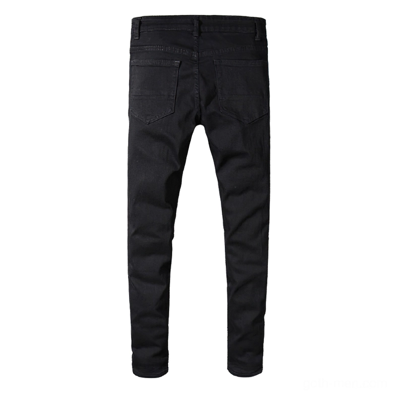 Black gothic distressed slim jeans back view showing dual patch pockets with rivets
