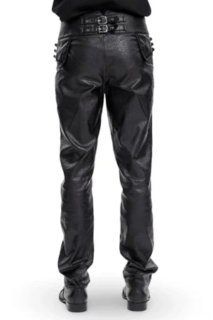Back view of black synthetic leather gothic pants on model, displaying rear pocket design and dual buckle waistband system