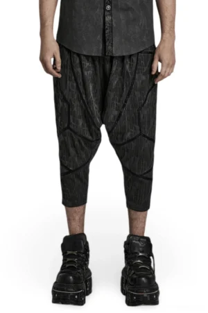 Gothic snake texture drop-crotch cropped pants front full-body view on male model