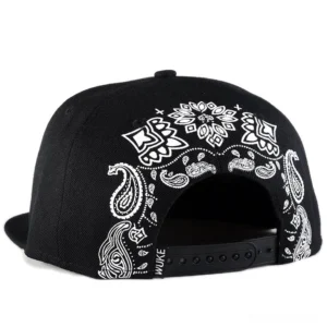 Adjustable snapback closure and rear view of black gothic cap with paisley bandana embroidery detail