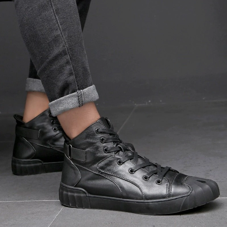 Black leather high-top gothic sneaker worn lifestyle shot demonstrating alternative fashion versatility