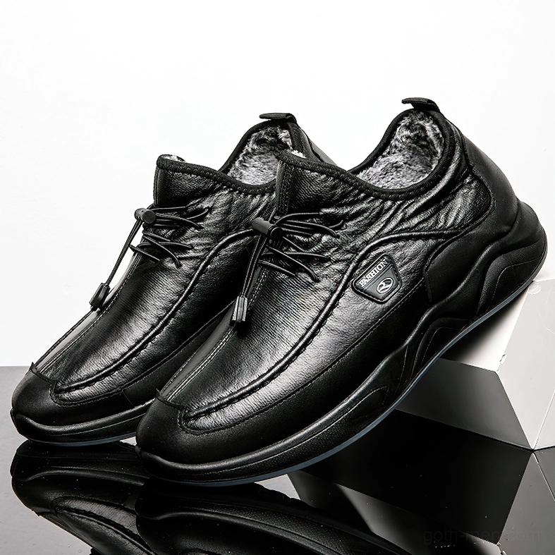 Black fleece-lined gothic sneaker showing fuzzy interior and textured leather upper, top view