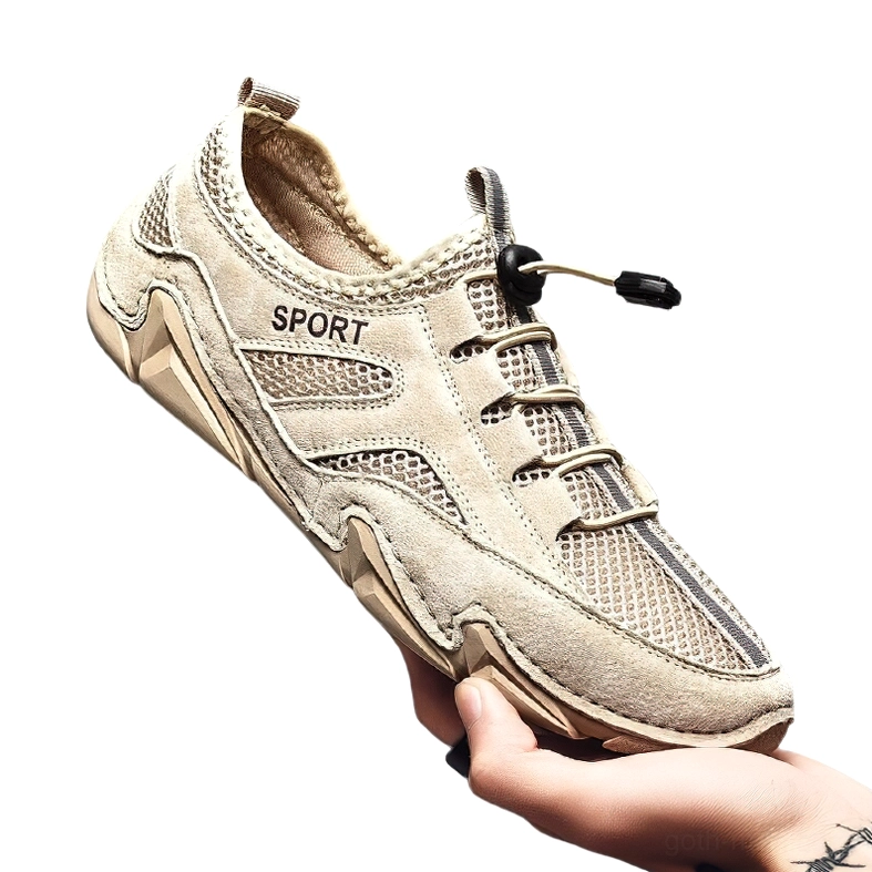 Split rubber outsole and mesh upper construction detail - bottom sole view of gothic casual sneaker