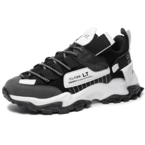 Dark gothic lace-up sneakers side front view black gray white colorway with reflective laces and branded side tag