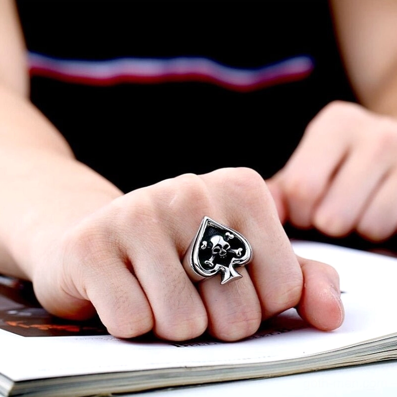 Polished stainless steel gothic spade ring with skull motif perfect for goth club and alternative fashion styling