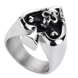 Thick gothic signet ring with spade shape and detailed skull crossbones three-quarter side profile