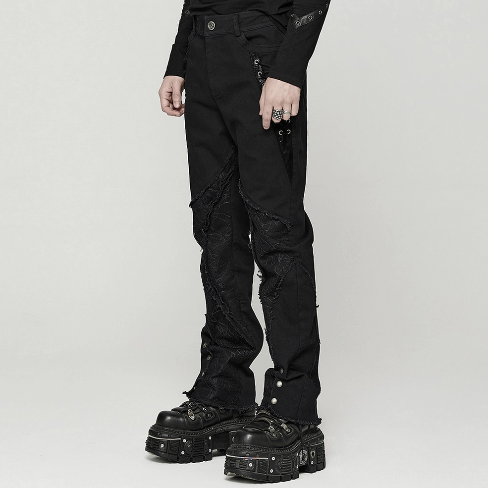 Flat lay display of complete black spider mesh gothic punk pants showing all design elements and construction