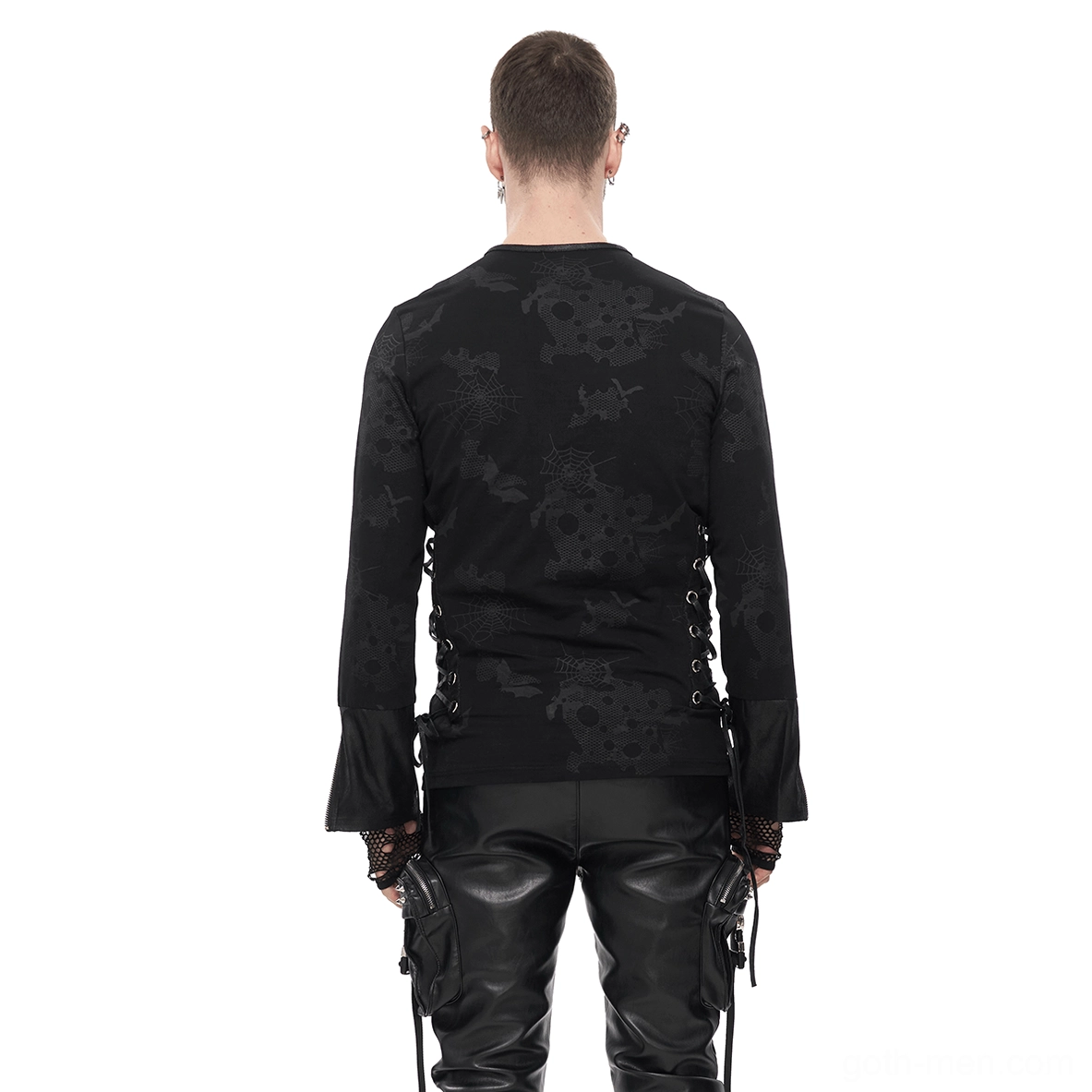Back view of gothic spider web sweatshirt showing full skull print pattern and side lace-up detail with leather pants styling