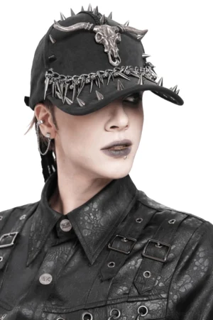 Black gothic spike baseball cap with bull skull plaque and metal chains - front view worn by male model with dreadlocks