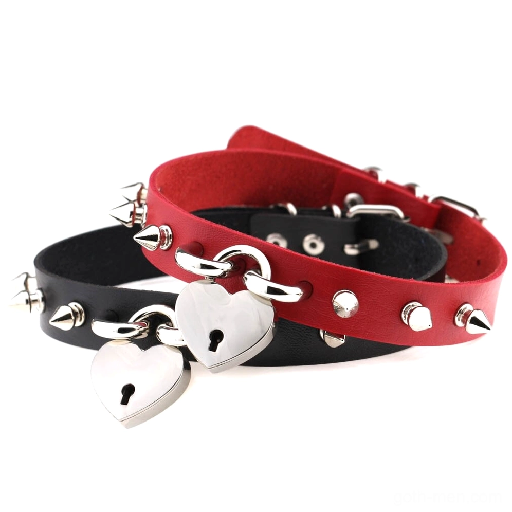 Multiple gothic heart lock spike chokers in red and black PU leather with silver hardware and matching lock keys displayed in flat lay