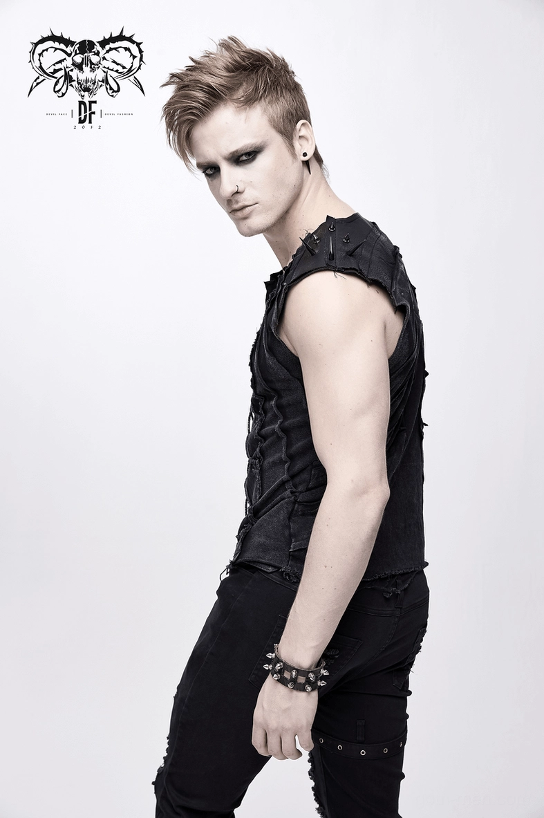 Detail shot of black gothic spike tank top showing lace-up front fastening and spike placement
