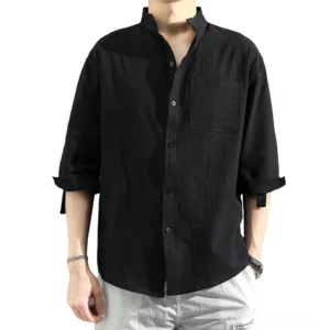 White gothic stand collar shirt front view on male model with rolled sleeves and chest pocket detail