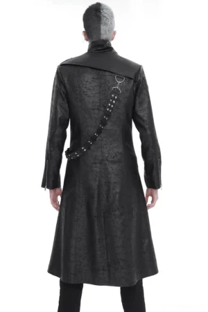 Gothic long trench coat back view showing cracked leather shoulder cape and rear crossbody strap with architectural draping