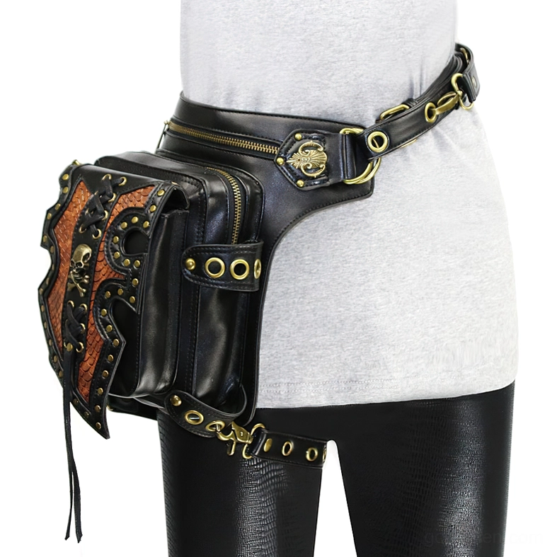 Gothic steampunk thigh and waist bag worn on female model, black PU leather with skull hardware and rivet trim, front left view