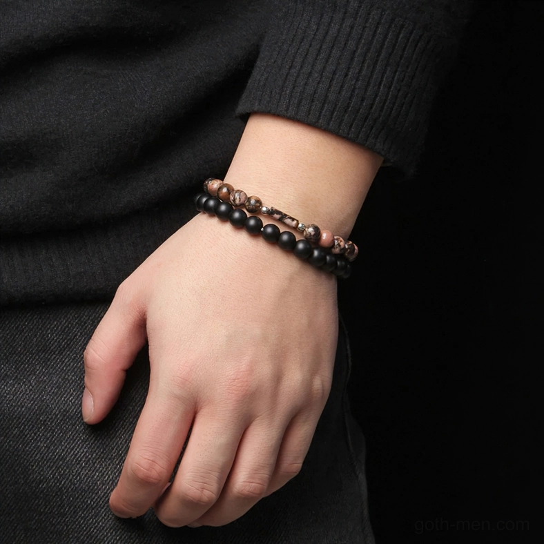 Black matte onyx stone beads gothic bracelet worn on male wrist - side view showing double layer construction