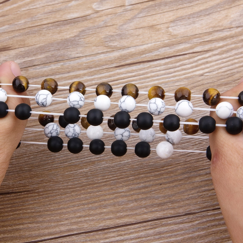 Gothic cubic zirconia beaded bracelet close-up detail natural onyx tiger eye