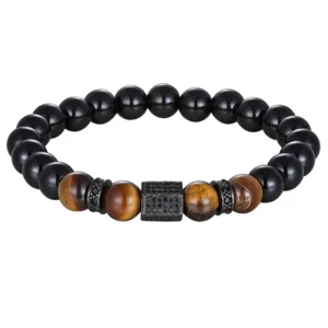 Gothic steel cubic zirconia beaded bracelet with matte onyx and tiger eye stones flat lay