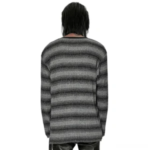 Back view of monochrome striped gothic sweater displaying loose fit silhouette and full-length sleeves in gradient stripe pattern