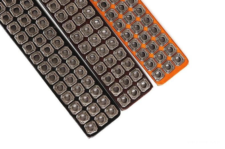 Gothic studded leather belt product showcase featuring metal rivet work and adjustable buckle system