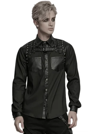Black gothic studded leather patchwork shirt front view on male model, showcasing rivet chest details and leather shoulder patches