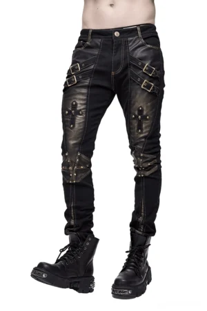 Men's black gothic studded slim pants with dual buckle straps and cross details - front full view on model
