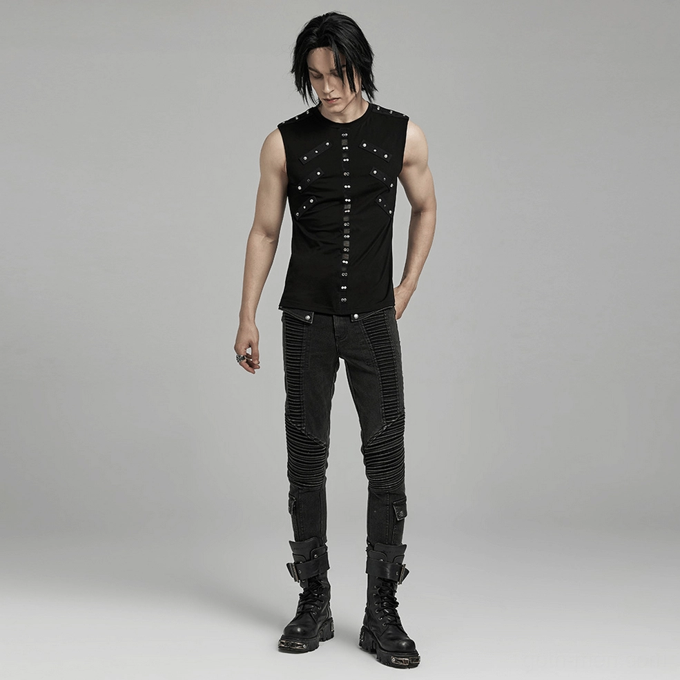 Full-body three-quarter view of punk gothic studded tank with black biker pants and boots