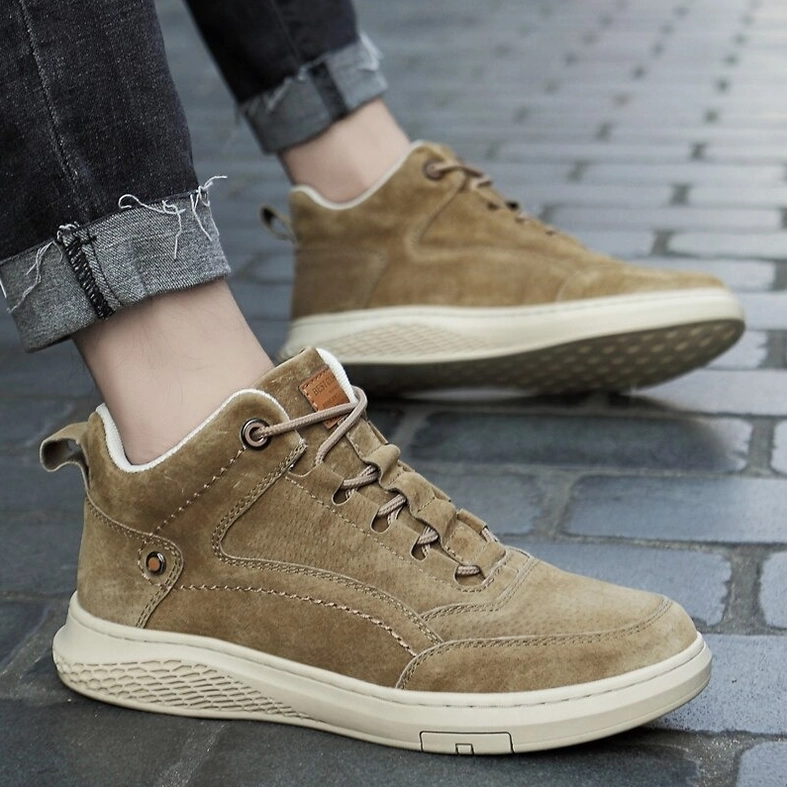 Alternative rear view of beige suede gothic ankle boots showcasing heel construction and back silhouette
