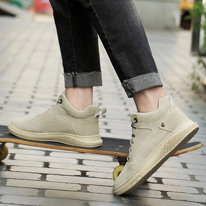 Alternative angle of beige suede gothic ankle boots showing material texture and craftsmanship