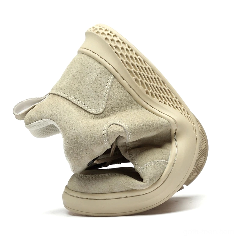 Men's gothic suede ankle boots styled flat lay showing full product silhouette and proportions