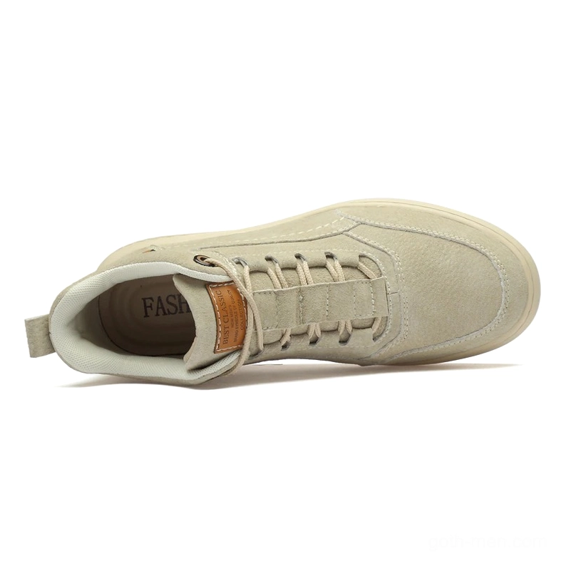 Top-down view of beige suede gothic ankle boots displaying flat cotton laces and heel pull tab details