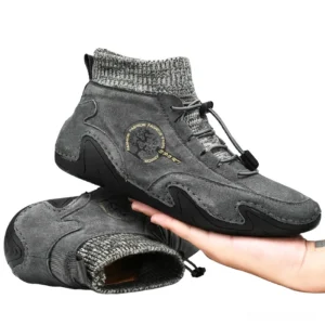 Dark grey gothic suede mid-top sneakers for men with knitted sock collar and toggle laces - three-quarter side view
