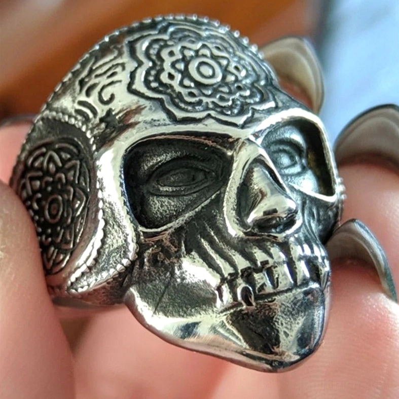 Sugar skull gothic ring right front angle showing intricate skull facial texture and mandala sacred geometry engraving