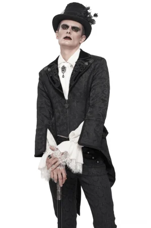 Black velvet swallowtail tailcoat front view on male model, gothic jacquard pattern and flared cuffs, studio photography