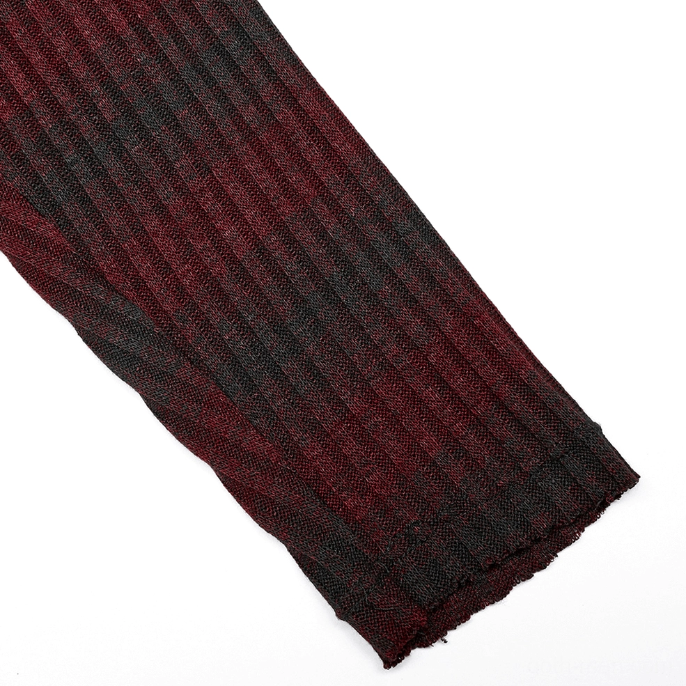 Sleeve detail of men's gothic striped knit sweater showing vertical ribbed knit construction
