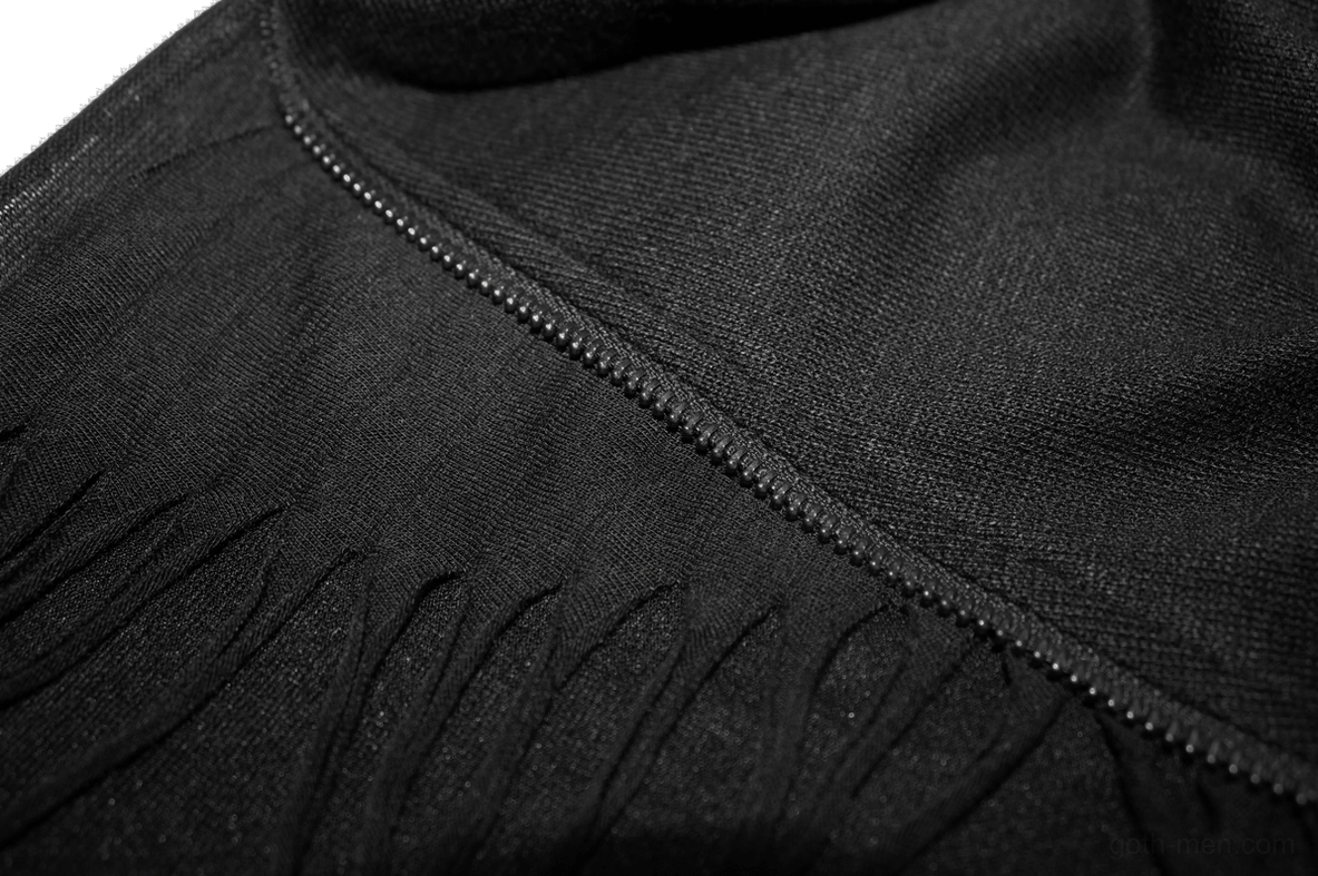 Black gothic sweatshirt diagonal zipper close-up with black metal hardware and frayed tassel trim