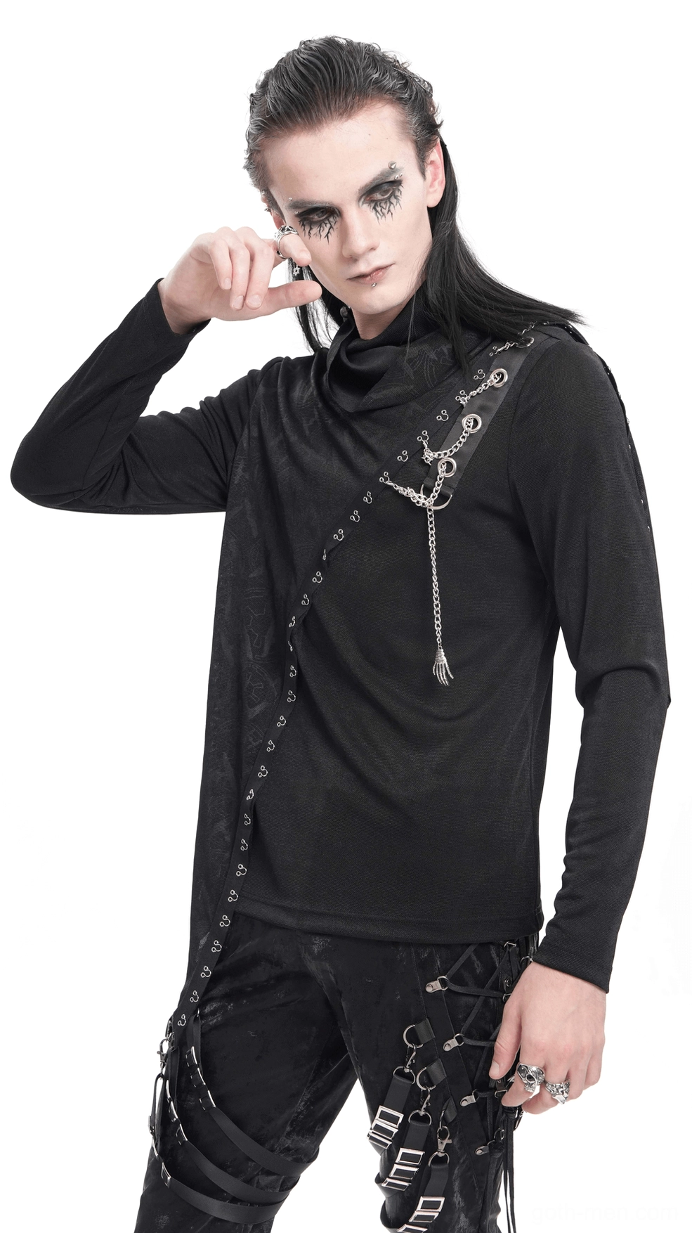 Texture and fabric detail of embossed gothic pattern with tonal printing on black polyester-elastane blend of asymmetrical sweatshirt