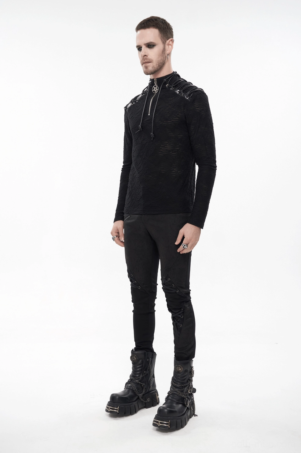 Black gothic sweatshirt shoulder lace-up design detail showing leather reinforcement and metal eyelet craftsmanship