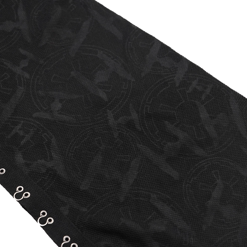 Close-up of turtleneck neckline and upper chest area showing chain tassel accents and fitted construction on gothic long-sleeve top