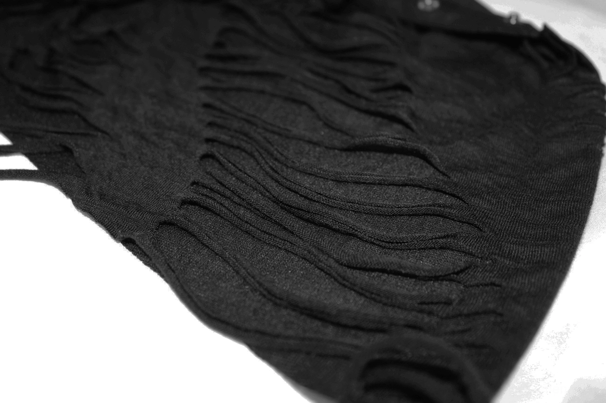Black gothic sweatshirt detail shot of zipper hardware and tassel combination on asymmetric side seam