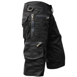 Black multi-pocket gothic military cargo shorts with zippered pockets, rear three-quarter view on white background