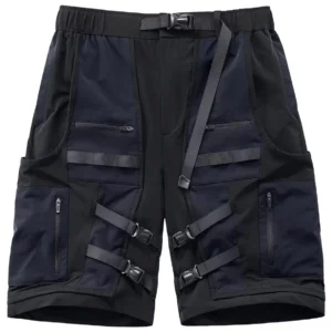 Gothic tactical cargo shorts front view flat lay - black multi-pocket design with webbing accents and color-blocking