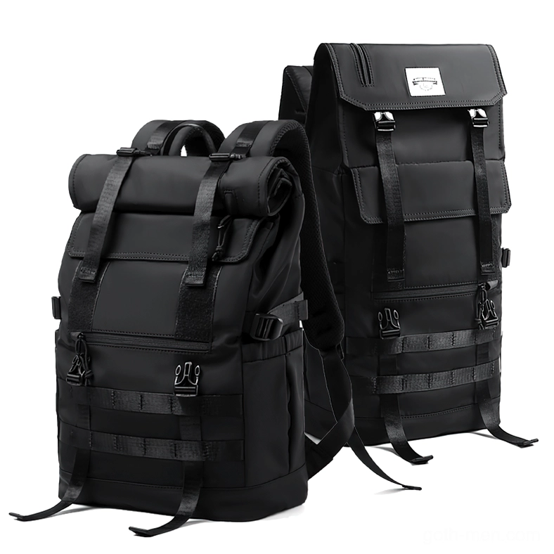 Black gothic tactical roll-top backpack dual three-quarter studio view showcasing water-resistant nylon and molle webbing details